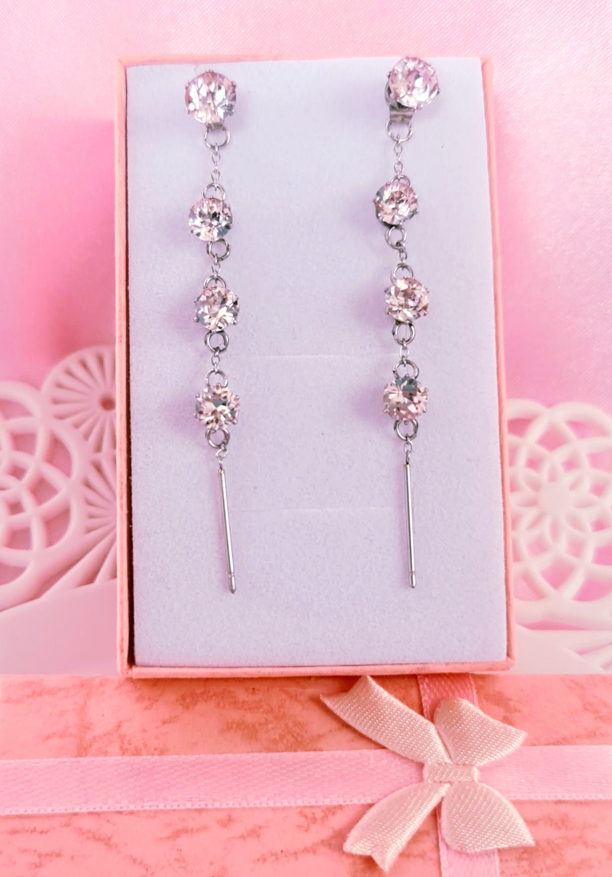 Orecchini fila di strass rosa