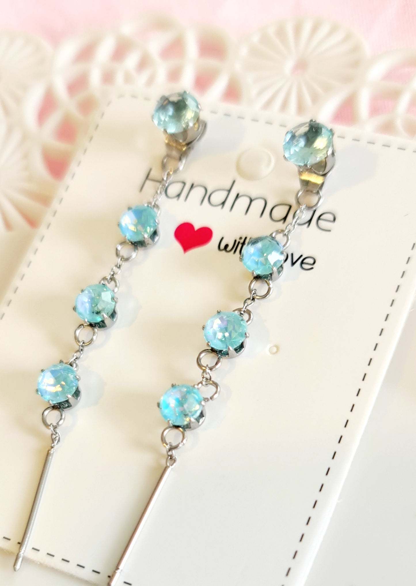 Orecchini fila di strass celesti