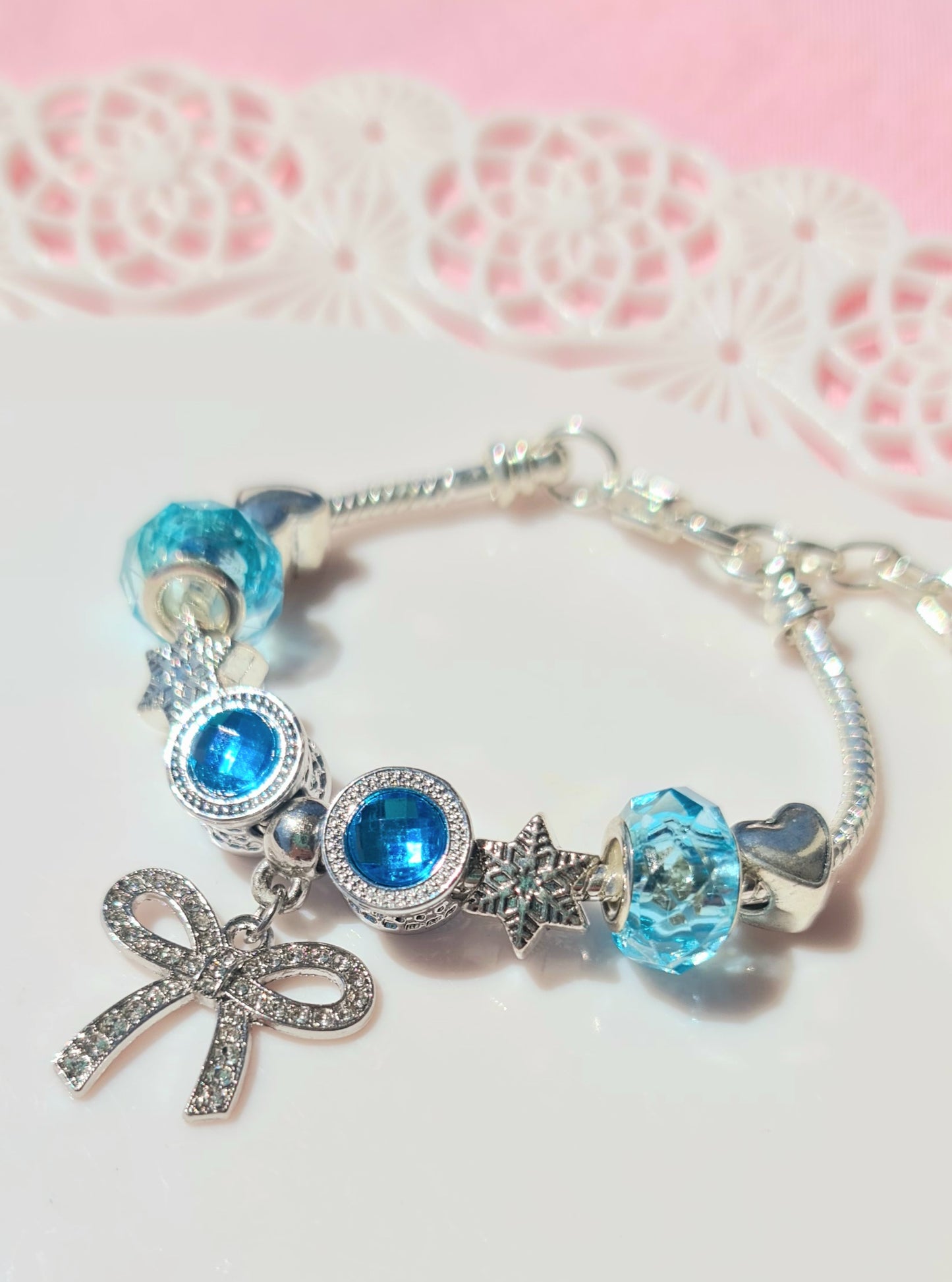 Bracciale con catena a serpente con charm fiocco