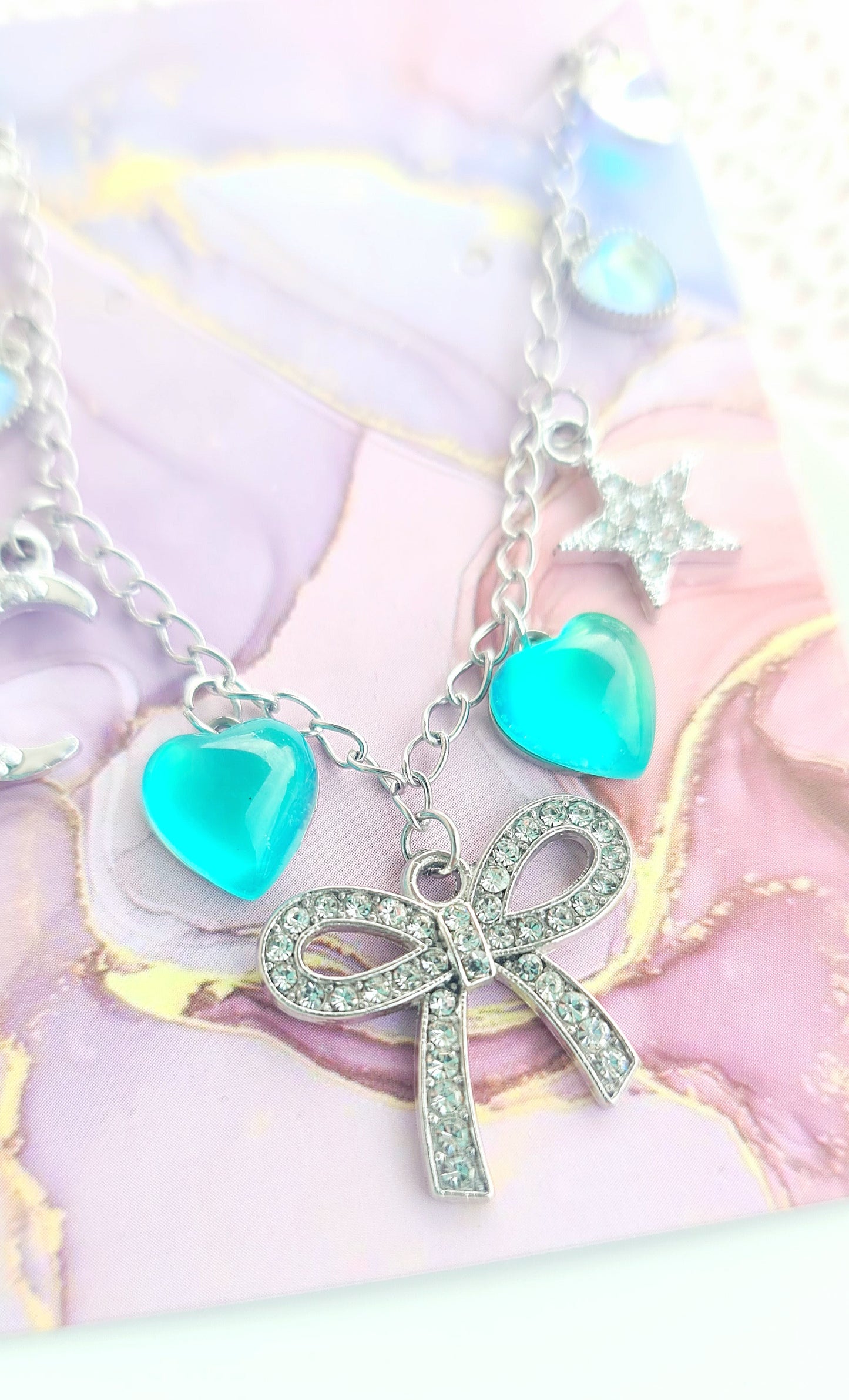 Bracciale con fiocco e cuori verde acqua