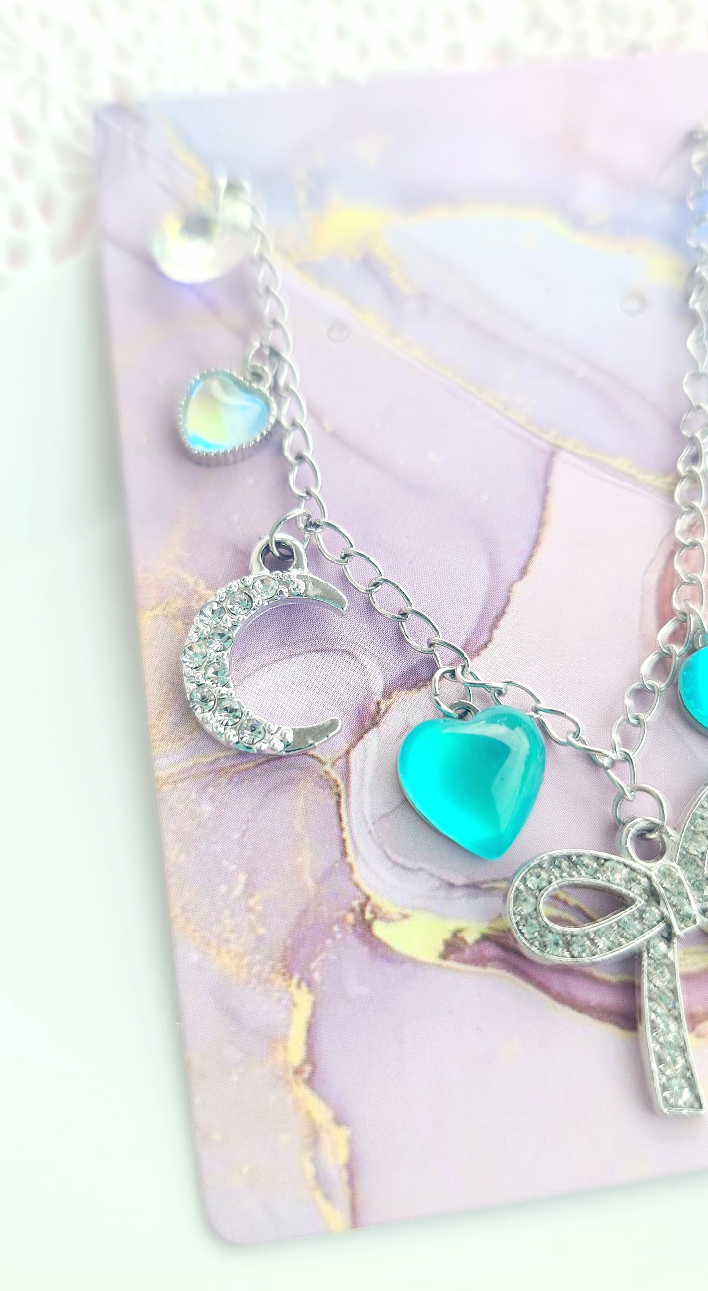 Bracciale con fiocco e cuori verde acqua