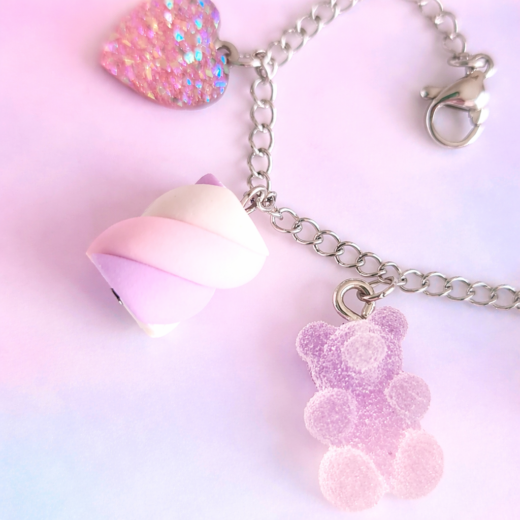 Bracciali con finti dolcetti rosa e lilla
