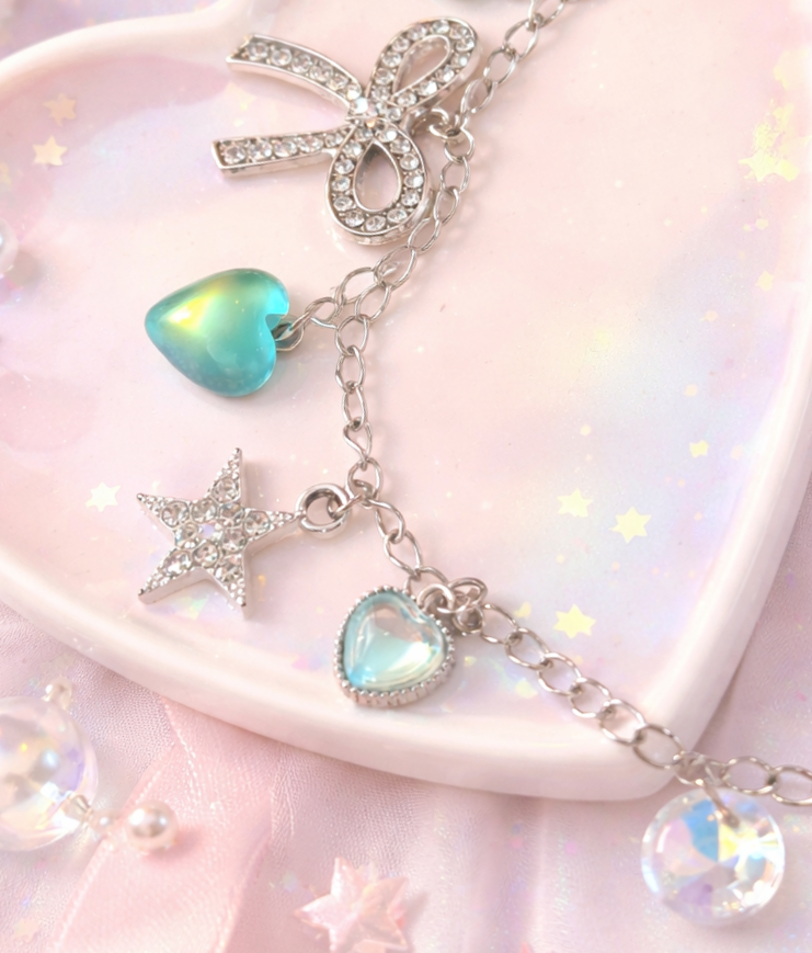 Bracciale con fiocco e cuori verde acqua